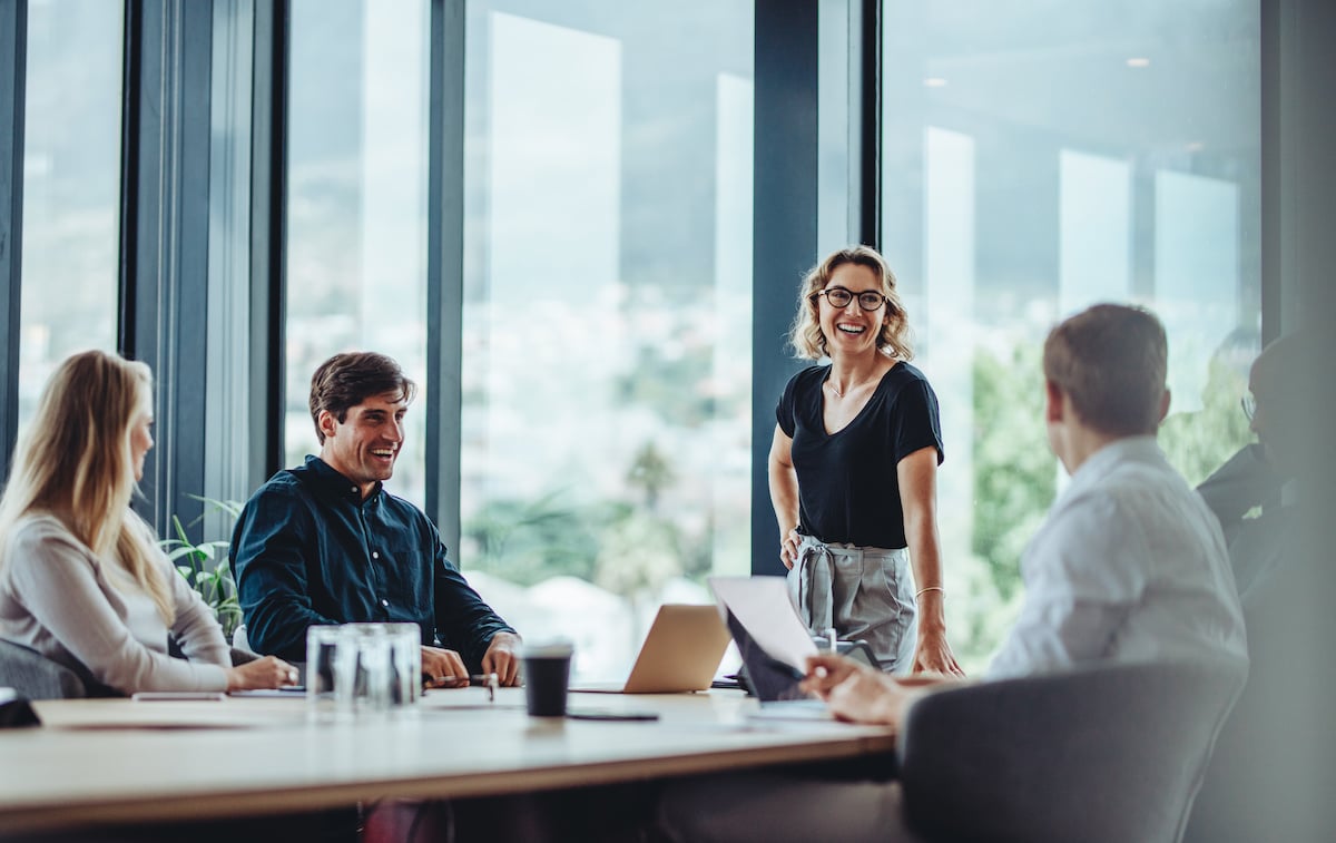 employees-talking-conference-room_369977292