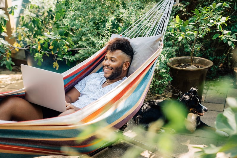 person looking on laptop