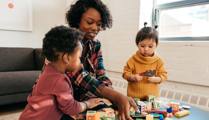 woman with children in a daycare