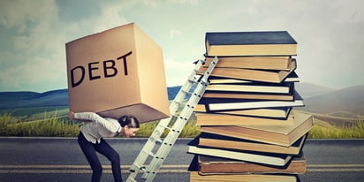 Woman carrying student loan debt