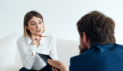woman talking to a man