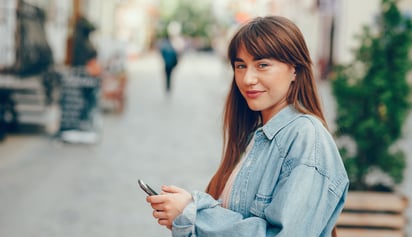 woman using her phone in Toronto