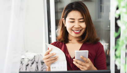 woman checking her electricity bill