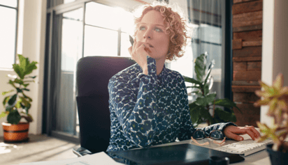 woman wondering and looking thoughtful