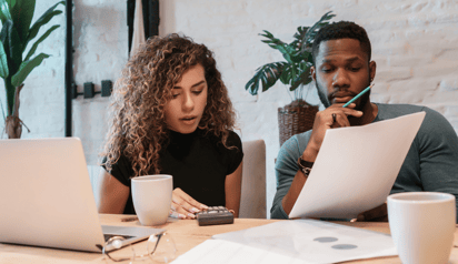 couple calculating their finances