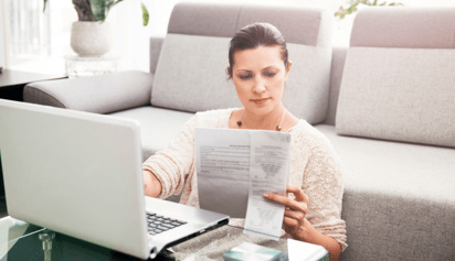 woman filing her taxes