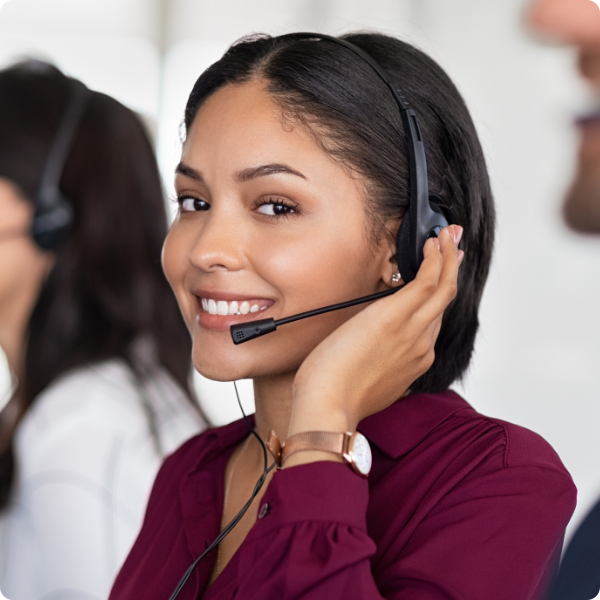 woman wearing a headset and smiling
