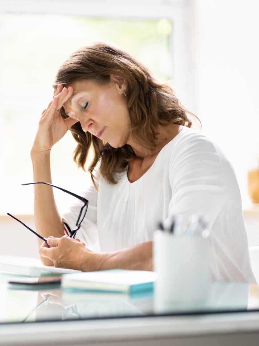 woman stressed about being scammed